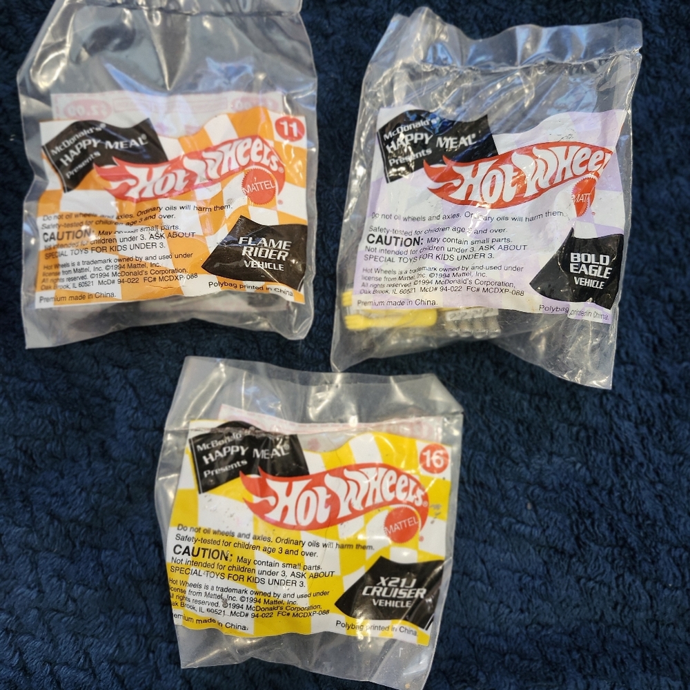 collection of three vintage 1994 McDonald's Happy Meal Hot Wheels toys